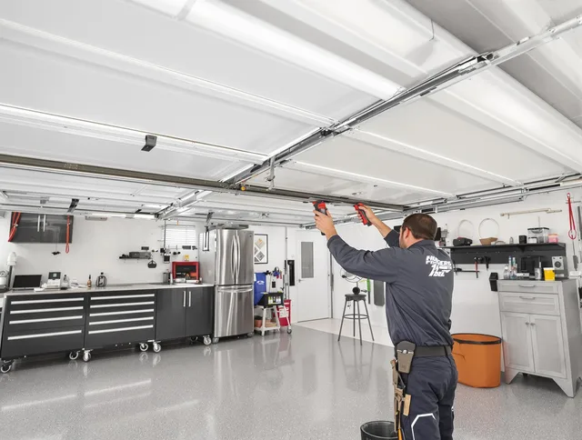 Overhead garage door repair service by East Hartford Garage Door Repair in East Hartford