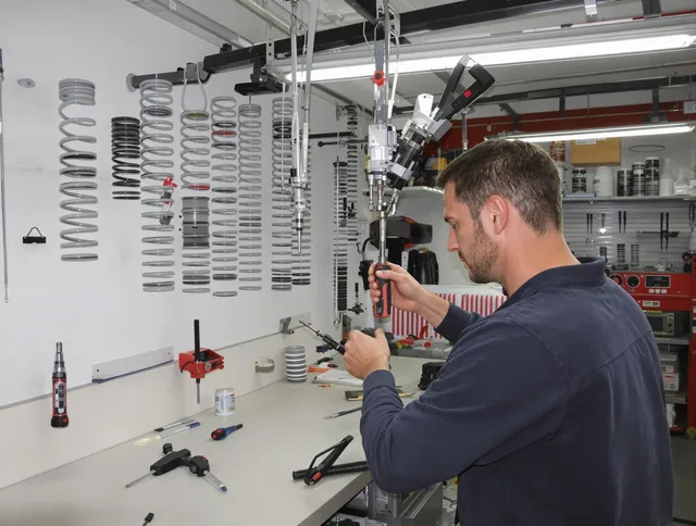 East Hartford Garage Door Repair safety certified technician performing precision spring replacement in East Hartford