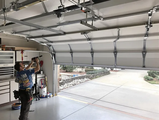 Garage door track repair service by East Hartford Garage Door Repair in East Hartford